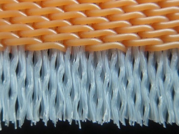 An orange vacuum filter belt detail