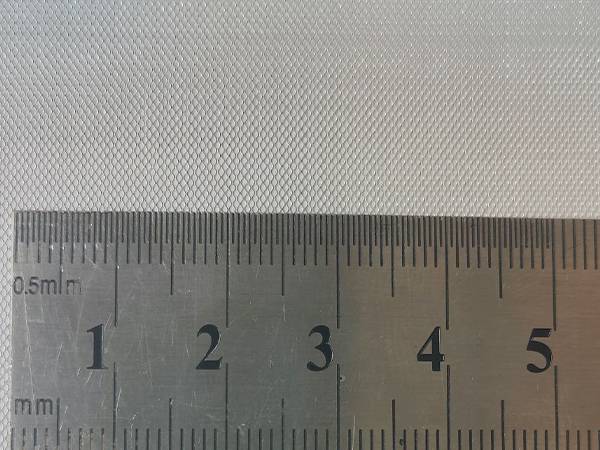 Measure the length of part of the microporous expanded mesh with a steel ruler