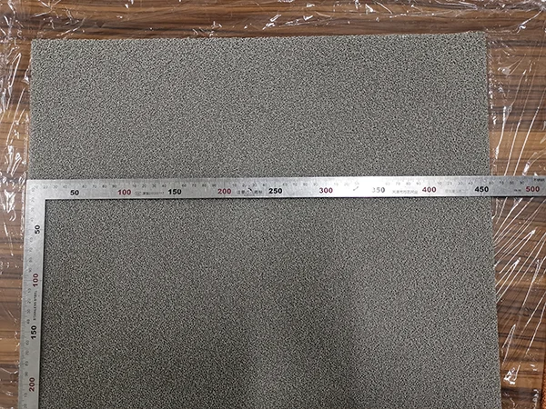 Steel ruler is used to measure the width of nickel foam.