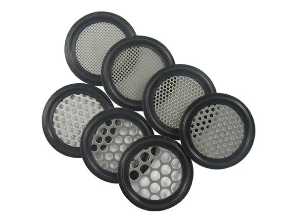 Several pieces of perforated plate tri-clamp screen gaskets on white background.