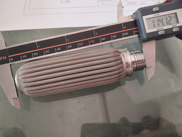 Measure the length of polymer sintered filters with a caliper.