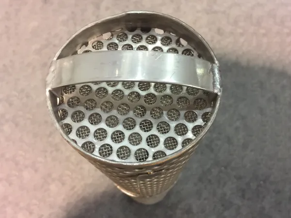 Perforated filter basket in a factory